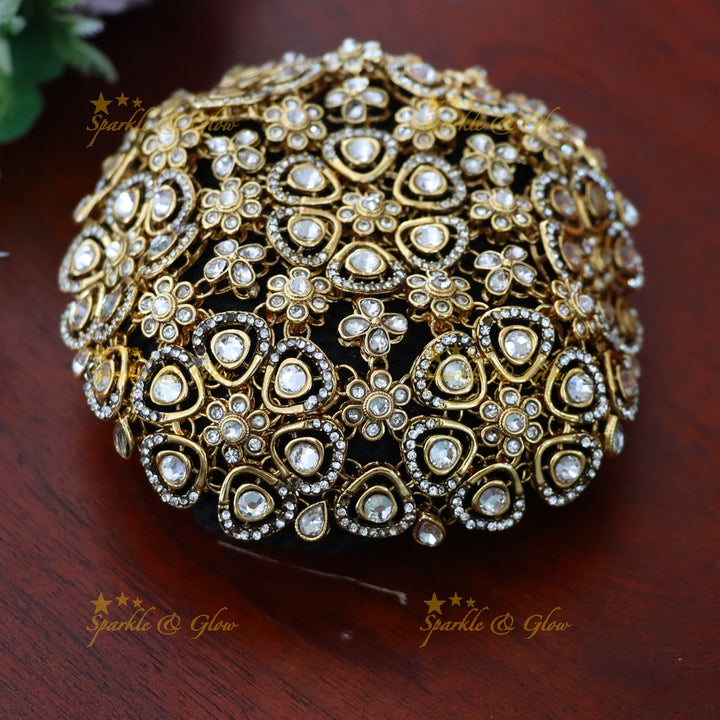 Luxurious Gold Floral Hair Bun for Festive Weddings