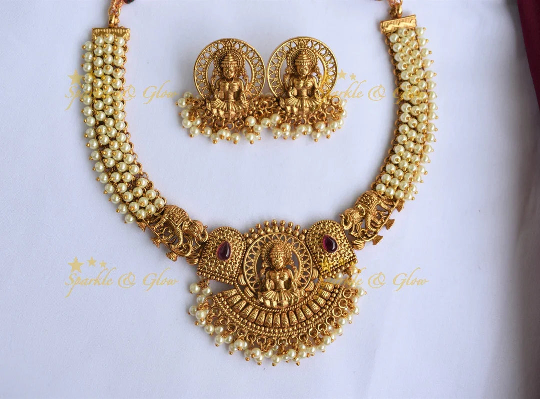 Gold Alike Elephant Intricately Carved Lakshmi pendent Kemp Stone Necklace with Gold beads - Sparkle and Glow