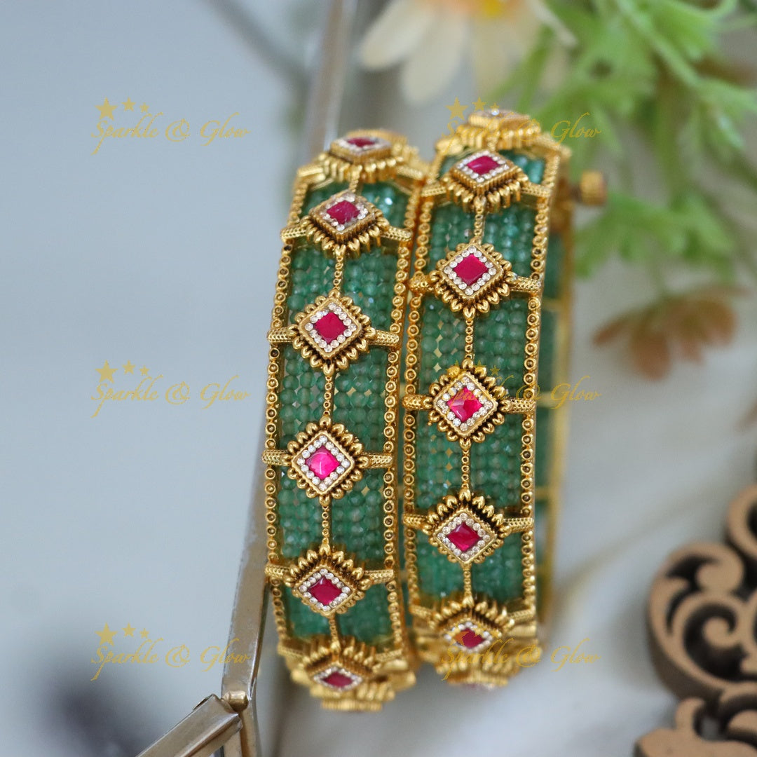 Elegant Gold Bangles with Green & Pink Gemstones
