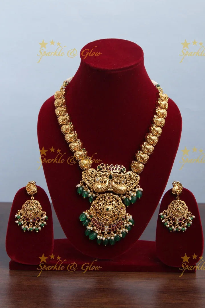 Gold alike non idol Peacock carved necklace - Green Beads - Sparkle and Glow