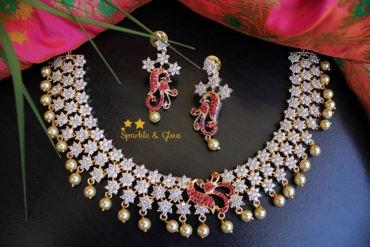 AD stones flower / star designed peacock necklace - White