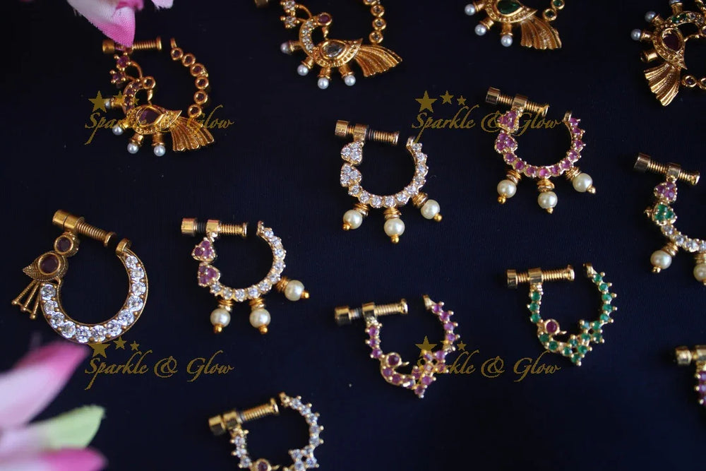 Gold polished AD stones peacock style screw nose pin - Sparkle and Glow