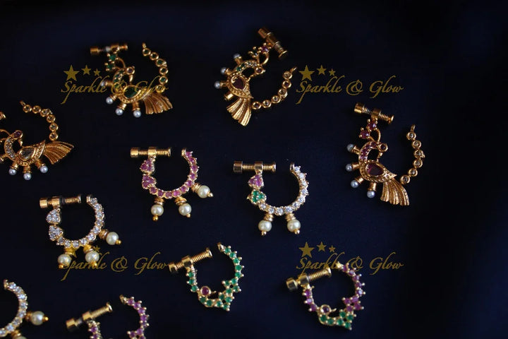 Gold polished AD stones peacock style screw nose pin - Sparkle and Glow