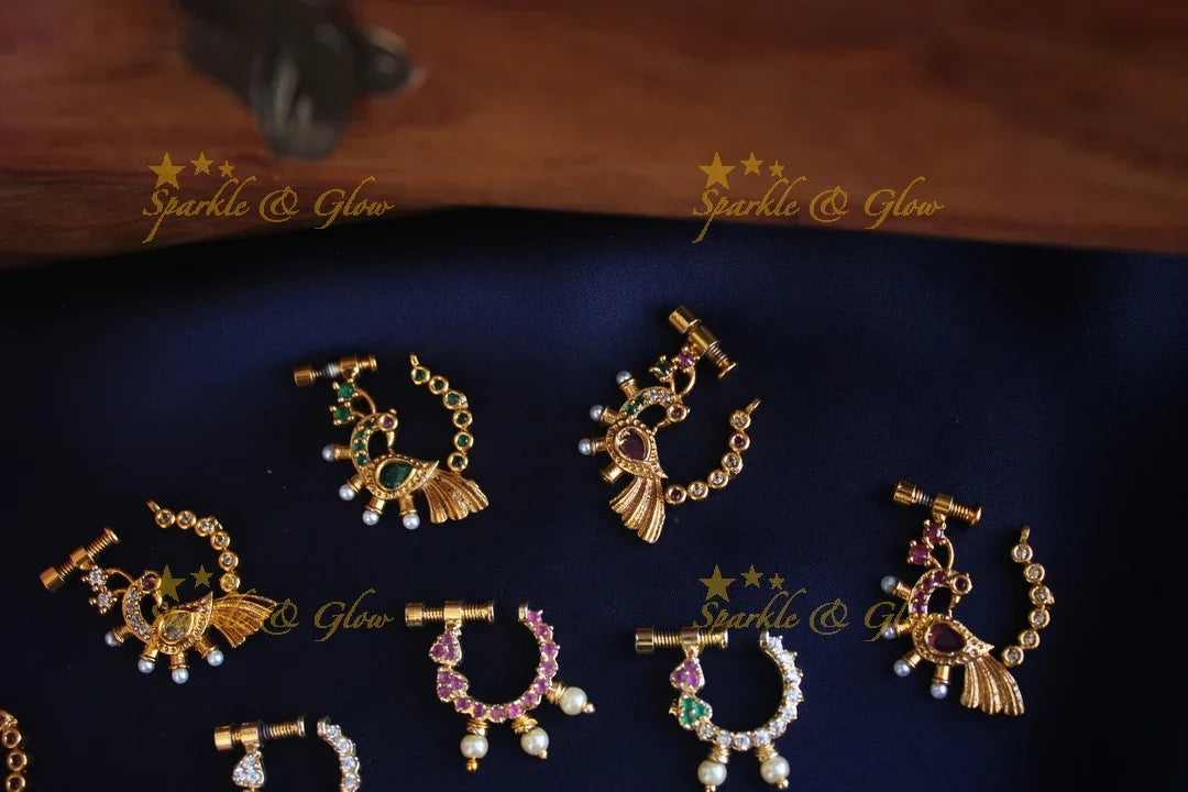 Gold polished AD stones peacock style screw nose pin - Sparkle and Glow