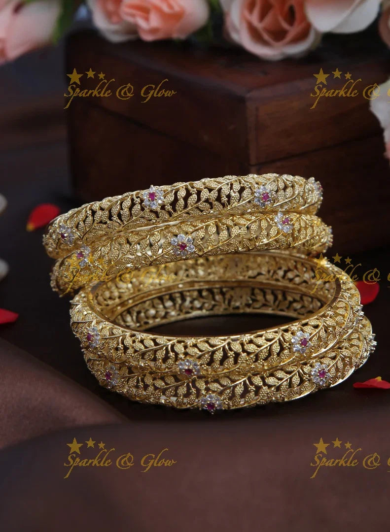 Gold stone leaf and flower carved bangles set of four - 2.8 - Sparkle and Glow
