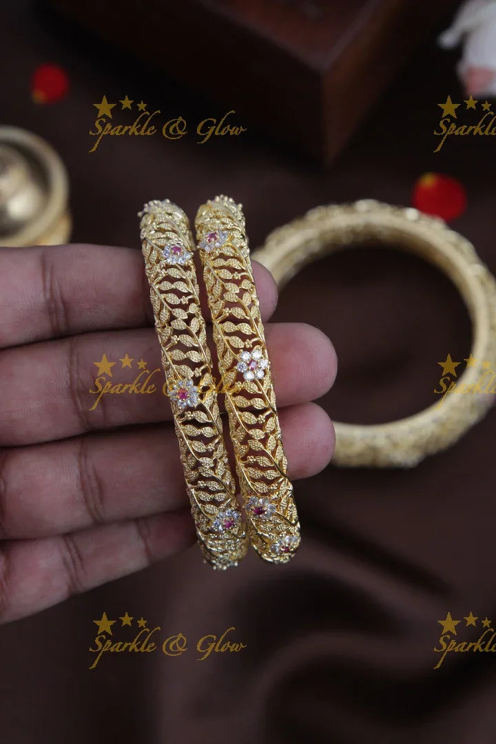Gold stone leaf and flower carved bangles set of four - 2.8 - Sparkle and Glow