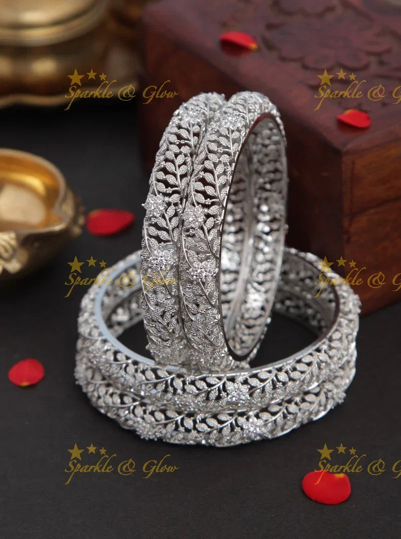 Gold stone leaf and flower carved bangles set of four - 2.8 - Sparkle and Glow