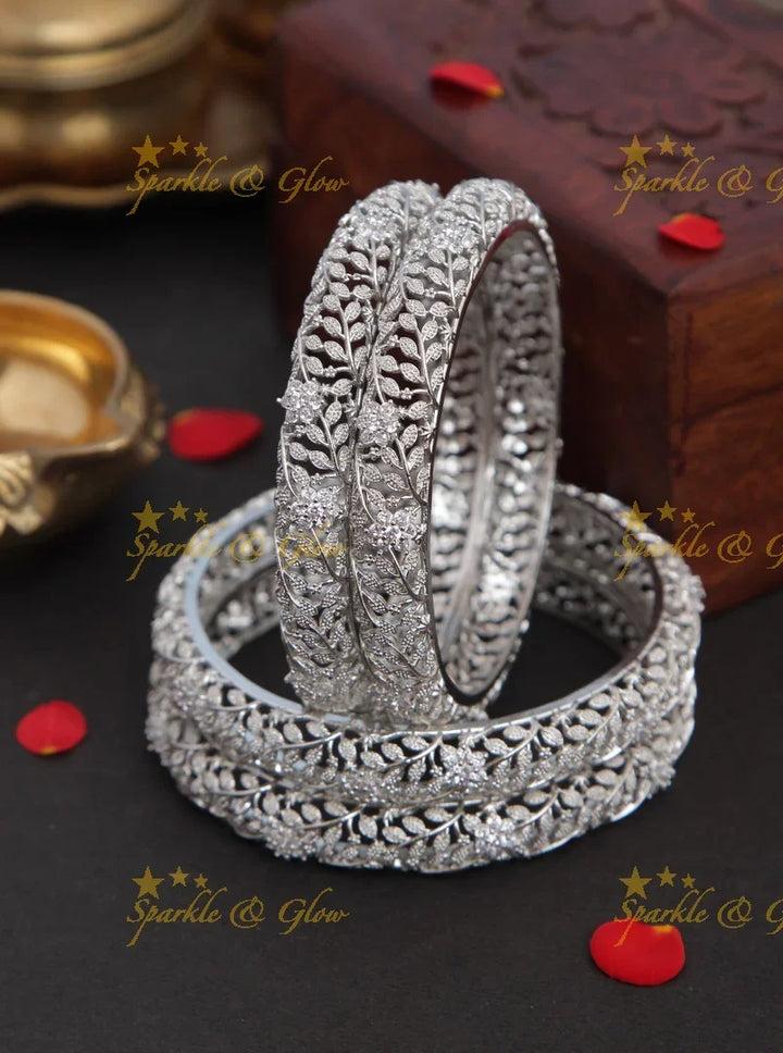 Gold stone leaf and flower carved bangles set of four - 2.8 - Sparkle and Glow