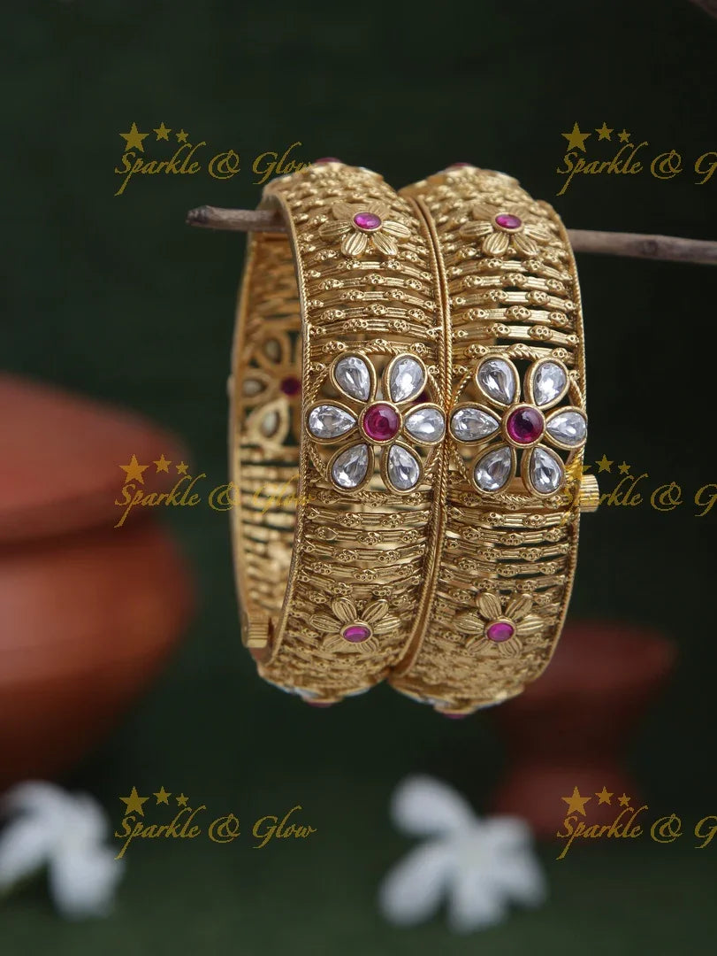 Gold alike Intricate carved screw type kada with kundan stones a pair - Sparkle and Glow