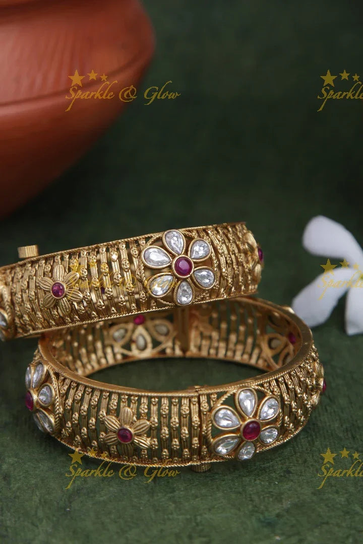 Gold alike Intricate carved screw type kada with kundan stones a pair - Sparkle and Glow