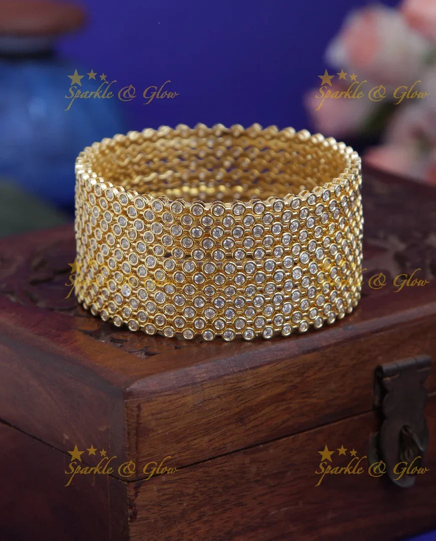Gold polished AD stone bangles set of 12 - 2.4 - Sparkle and Glow