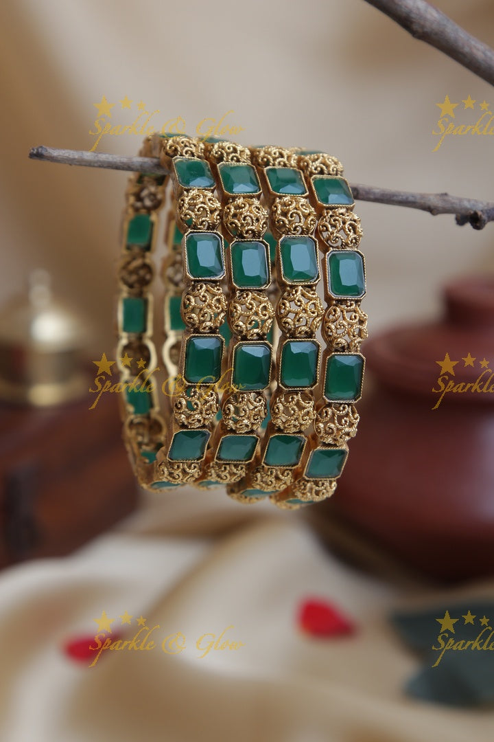 Gold alike stone bangles set of four