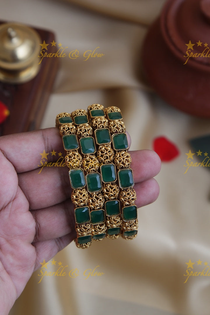Gold alike stone bangles set of four
