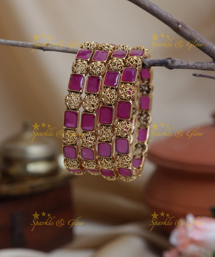 Gold alike stone bangles set of four