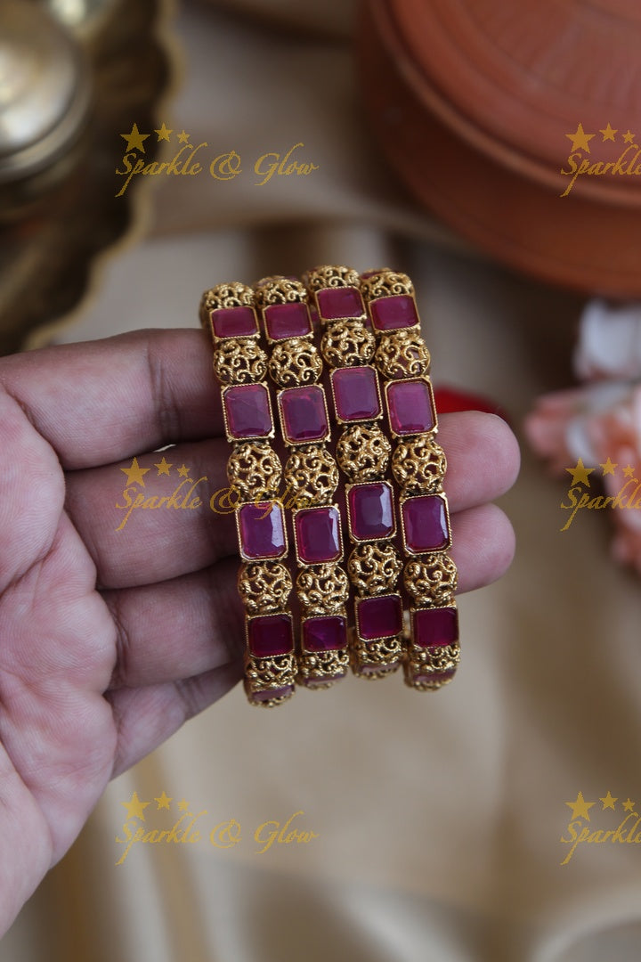 Gold alike stone bangles set of four
