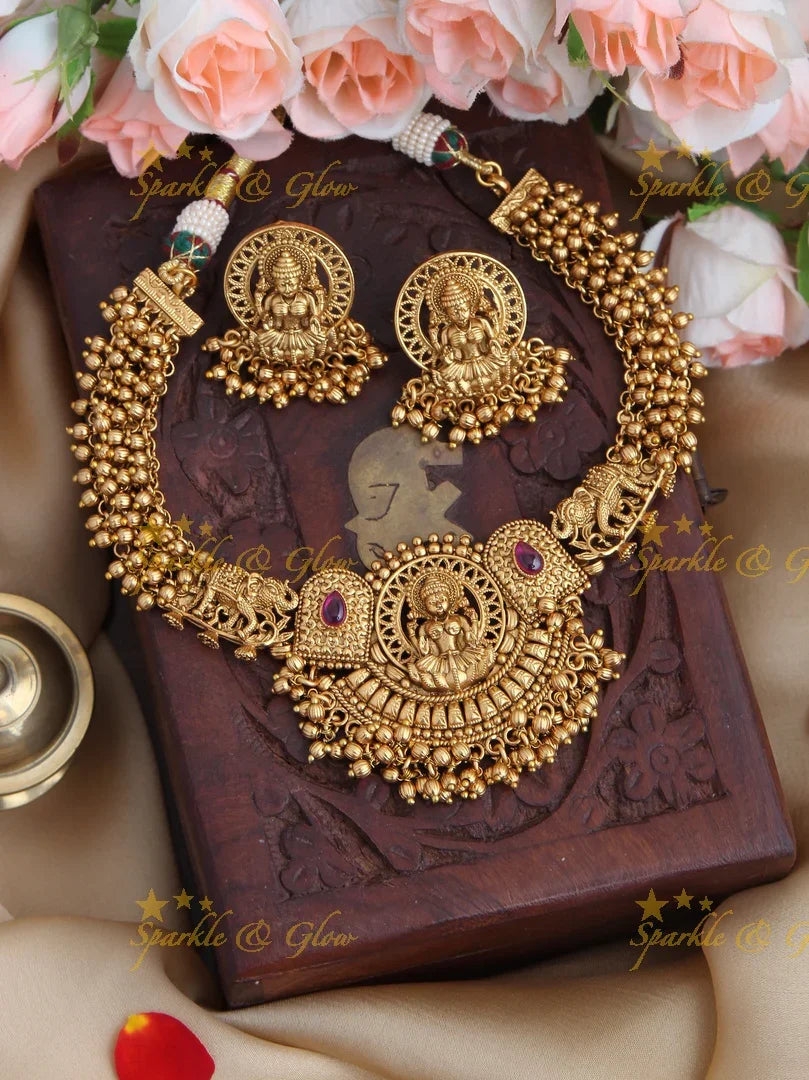Gold Alike Elephant Intricately Carved Lakshmi pendent Kemp Stone Necklace with Gold beads - Sparkle and Glow
