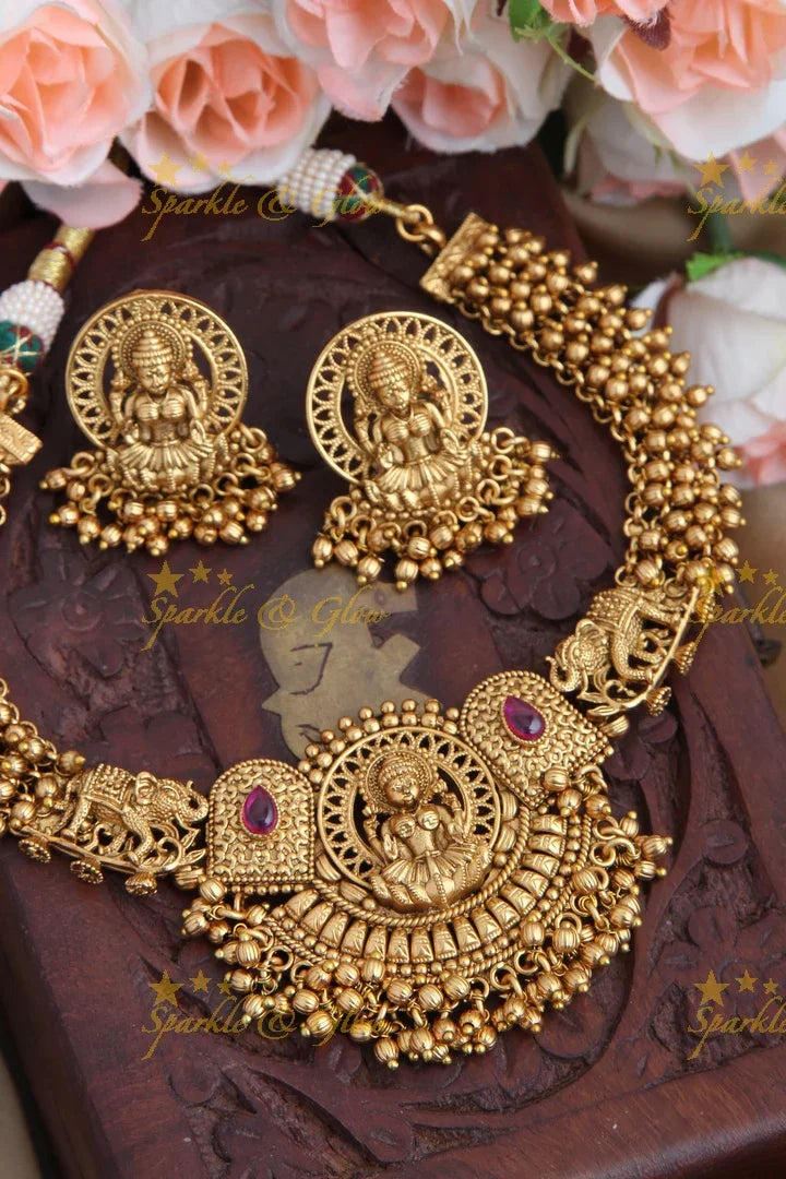 Gold Alike Elephant Intricately Carved Lakshmi pendent Kemp Stone Necklace with Gold beads - Sparkle and Glow