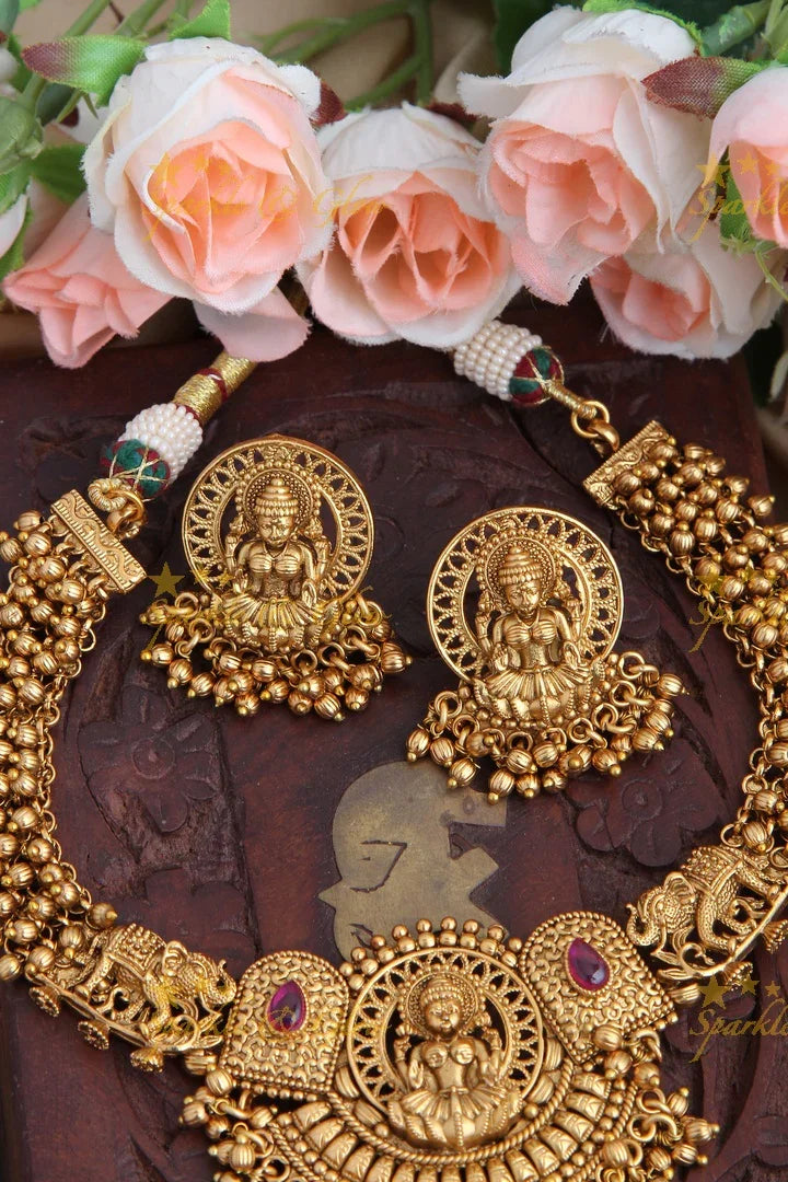 Gold Alike Elephant Intricately Carved Lakshmi pendent Kemp Stone Necklace with Gold beads - Sparkle and Glow