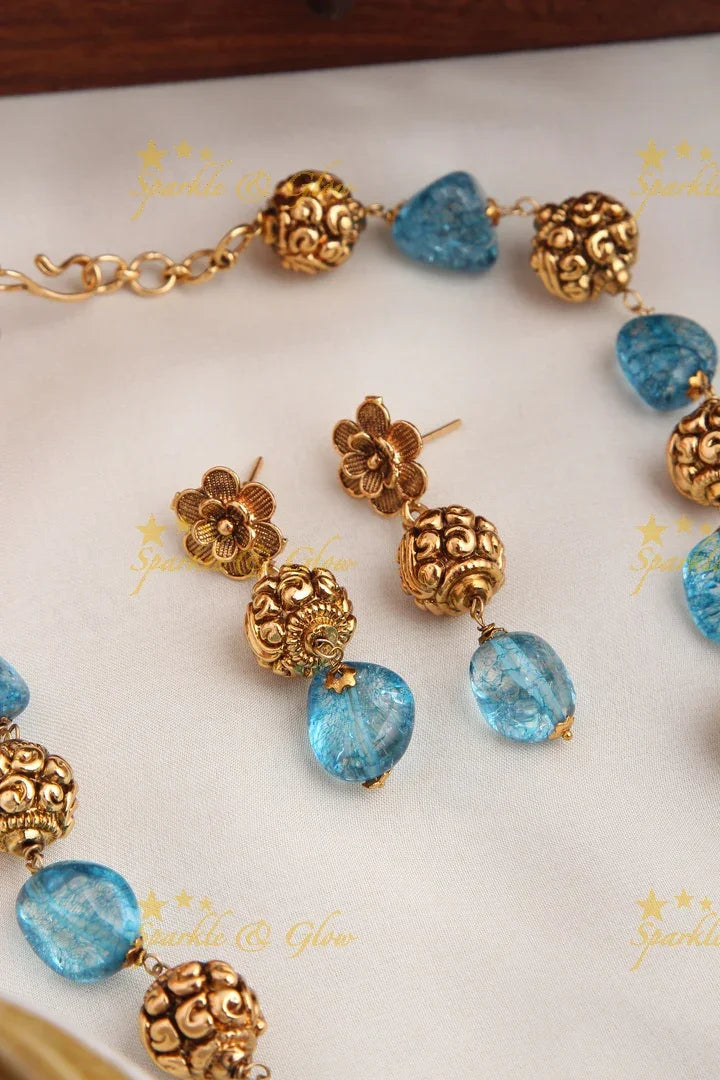Antique Transparent Stone Gold Bead Necklace with Floral Studded Earrings - Sky Blue - Sparkle and Glow
