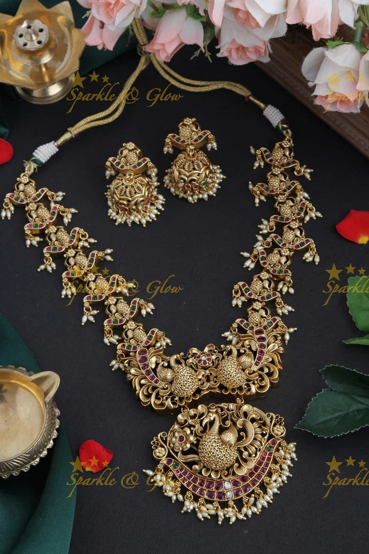 Intricately Carved Peacock Kemp Stone Rice Pearl Necklace - Sparkle and Glow