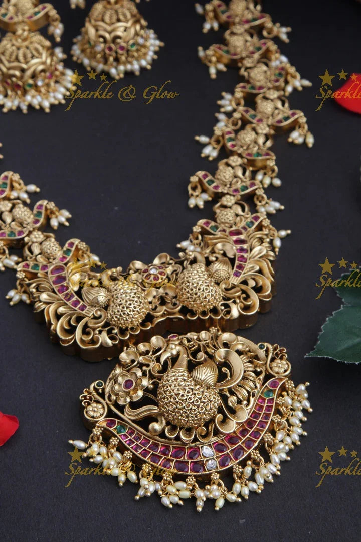 Intricately Carved Peacock Kemp Stone Rice Pearl Necklace - Sparkle and Glow