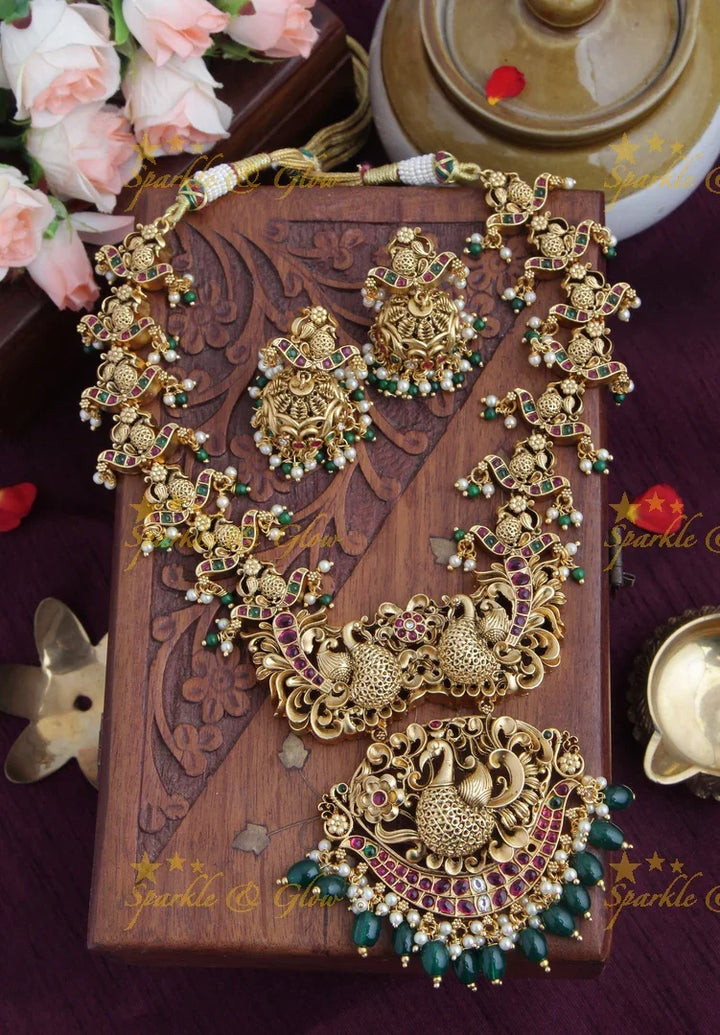 Intricately Carved Peacock Kemp Stone Rice Pearl Necklace - Sparkle and Glow