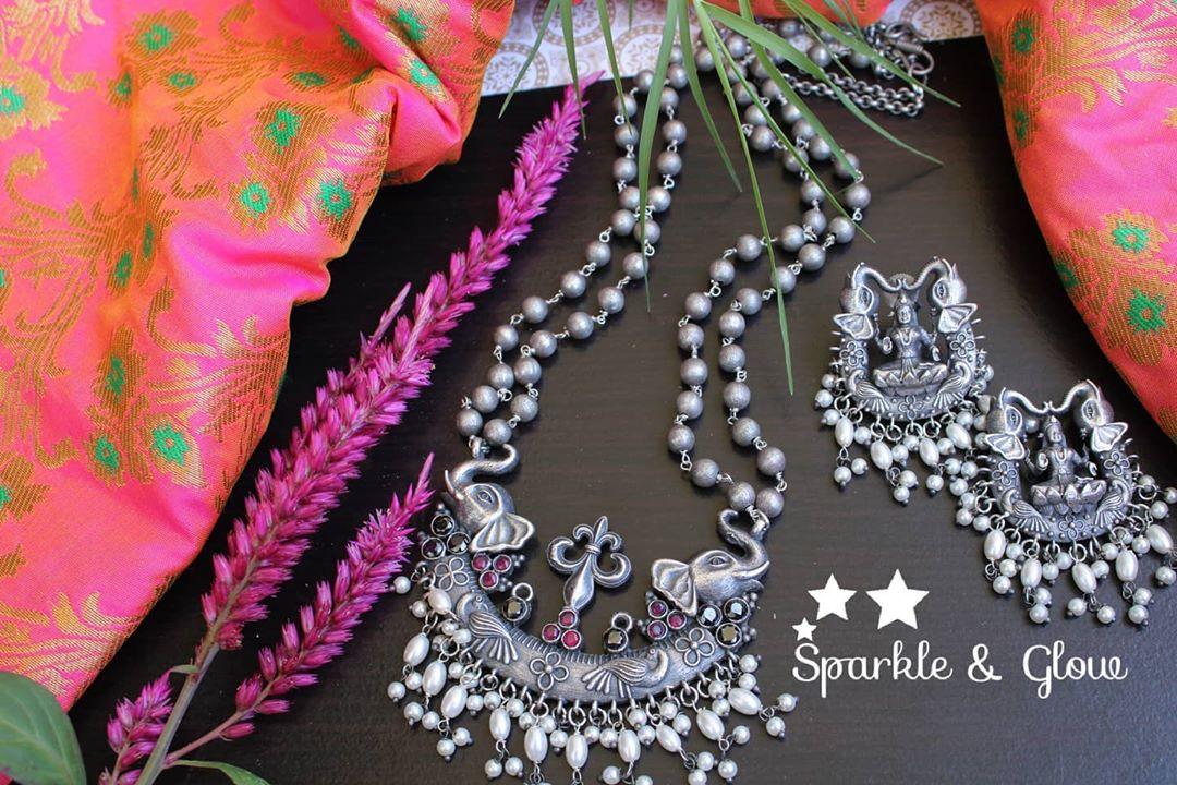Silver look alike layered beads necklace with Elephant and lakshmi carved necklace -White - Sparkle and Glow