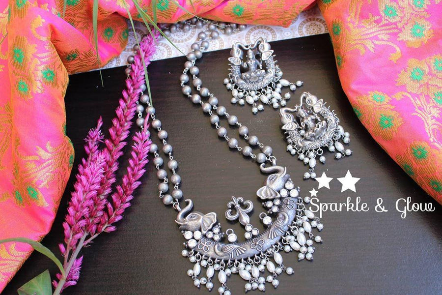 Silver look alike layered beads necklace with Elephant and lakshmi carved necklace -White - Sparkle and Glow