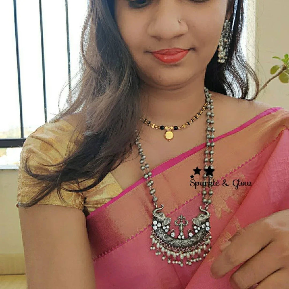 Silver look alike layered beads necklace with Elephant and lakshmi carved necklace -White - Sparkle and Glow