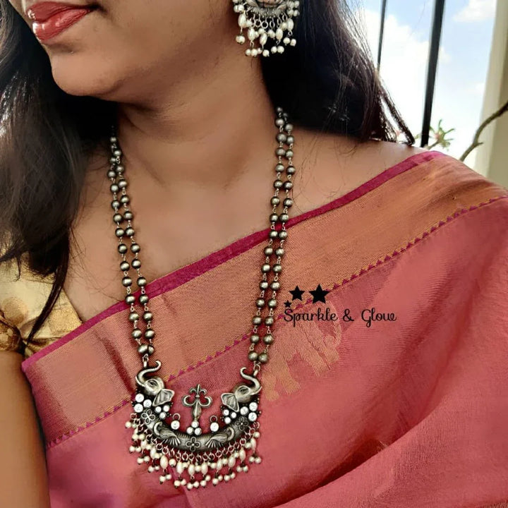 Silver look alike layered beads necklace with Elephant and lakshmi carved necklace -White - Sparkle and Glow