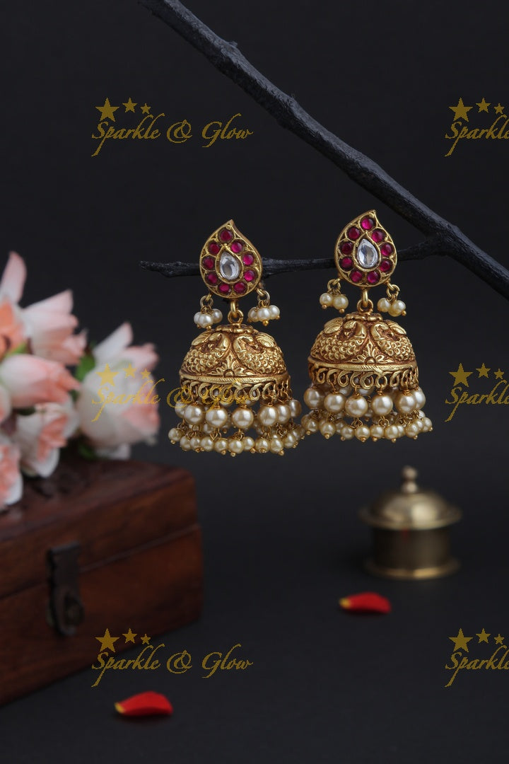 Gheru finish Peacock Jhumkas with pearls