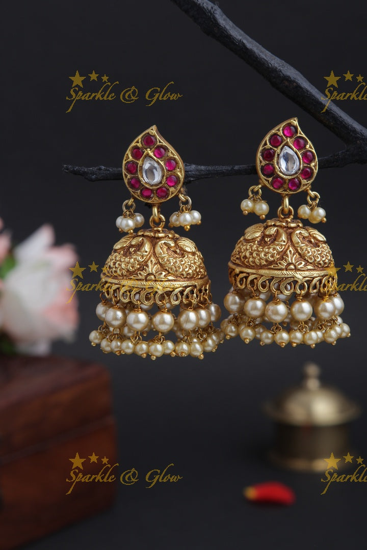 Gheru finish Peacock Jhumkas with pearls