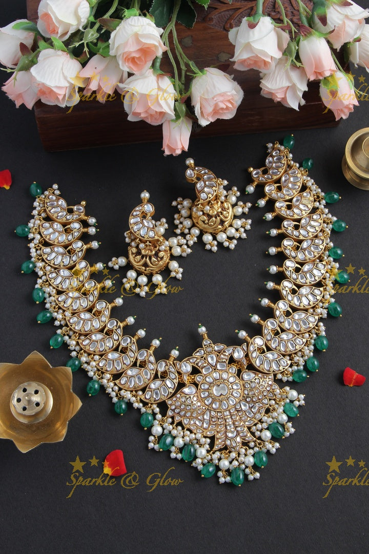 Intricately Craved Peacock Necklace with Green Beads