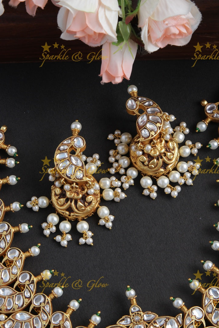 Intricately Craved Peacock Necklace with Green Beads