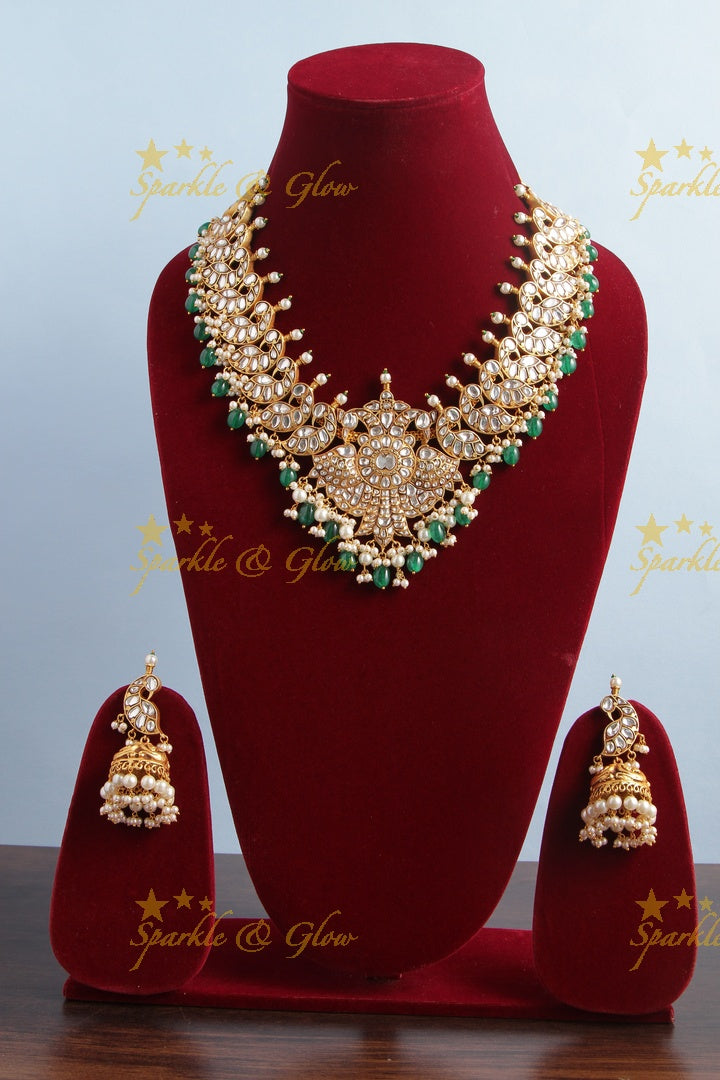Intricately Craved Peacock Necklace with Green Beads
