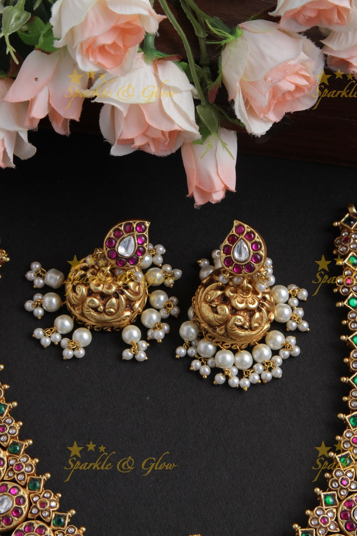 Intricately Craved Mango Peacock Necklace with Ganesh Pendent