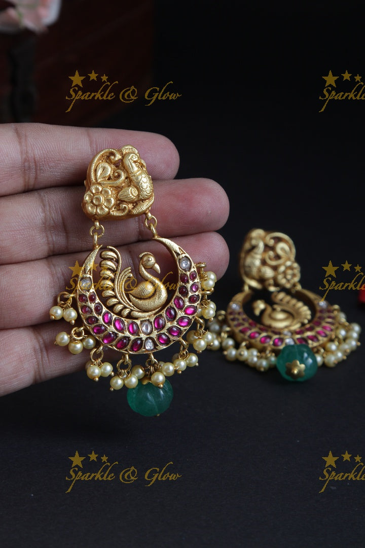 Intricately Carved Peacock Chandbalis with Green beads