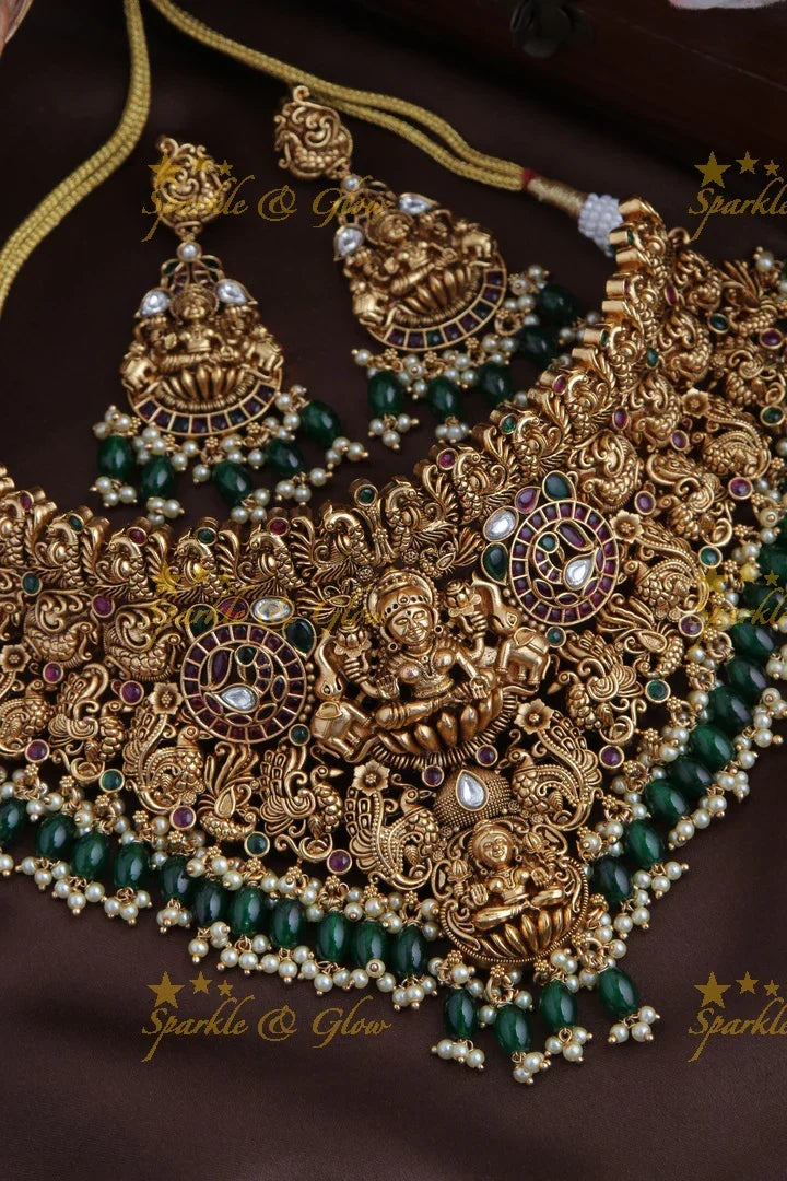 Intricately Carved Lakshmi Elephant Peacock High Neck Choker - Green beads - Sparkle and Glow