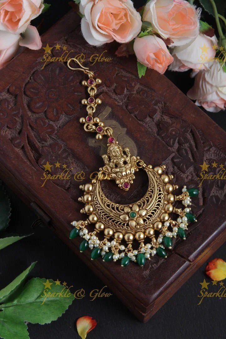 Gold Alike Lakshmi Floral Maang Tikka with Green beads - Sparkle and Glow