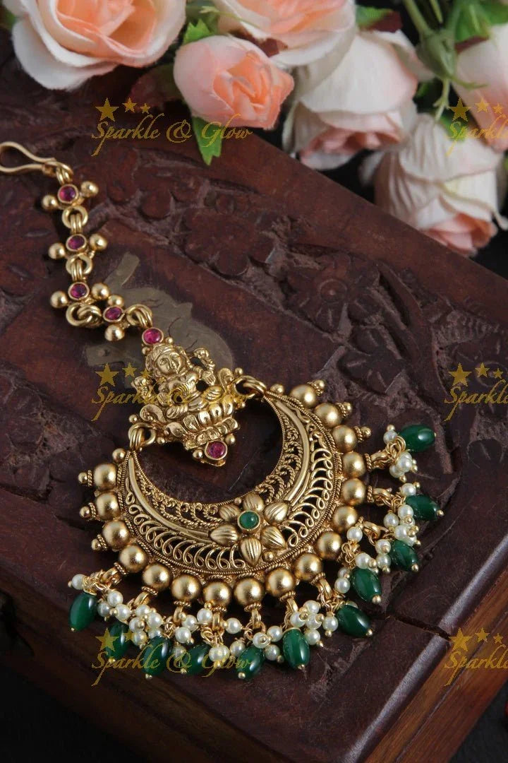 Gold Alike Lakshmi Floral Maang Tikka with Green beads - Sparkle and Glow