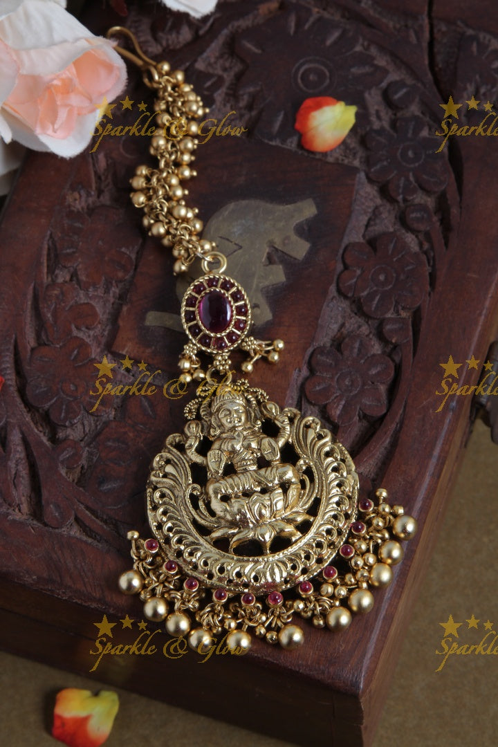 Gold Alike Lakshmi Maang Tikka with Gold beads - Pink