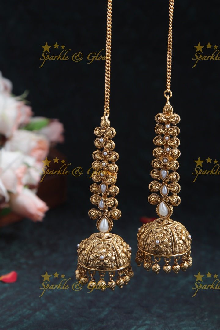 Gold alike finish jhumukas with ear chain - Pearl - Sparkle and Glow - Coral - 