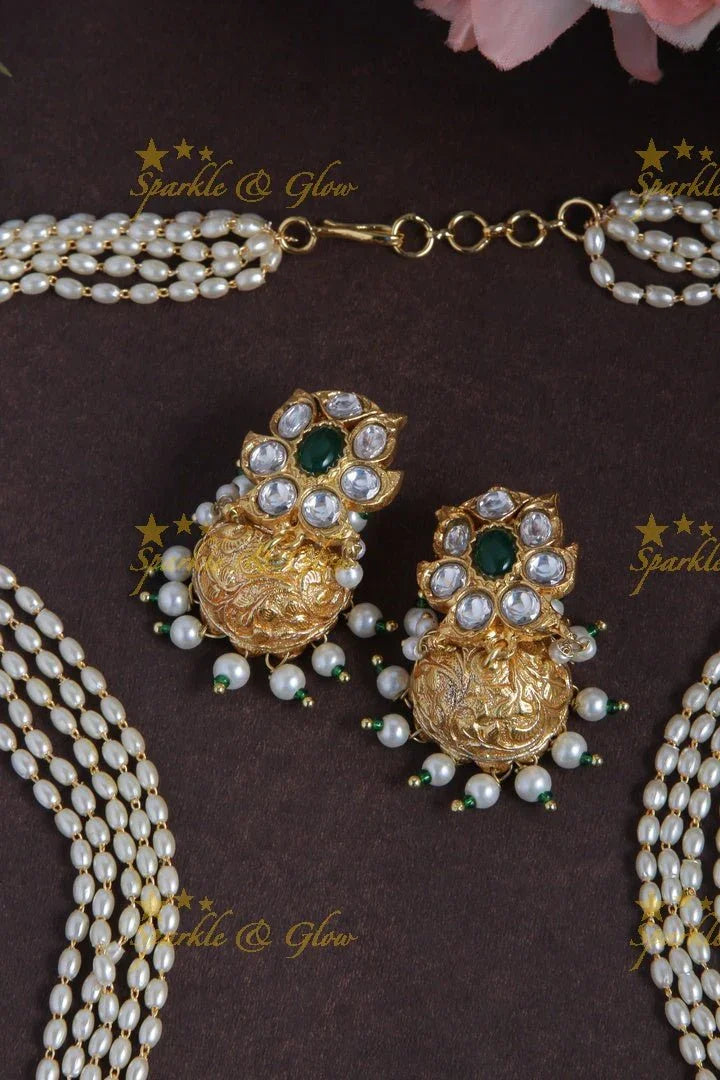 Exclusively Carved Mango Lakshmi Pendent with Green beads - Sparkle and Glow
