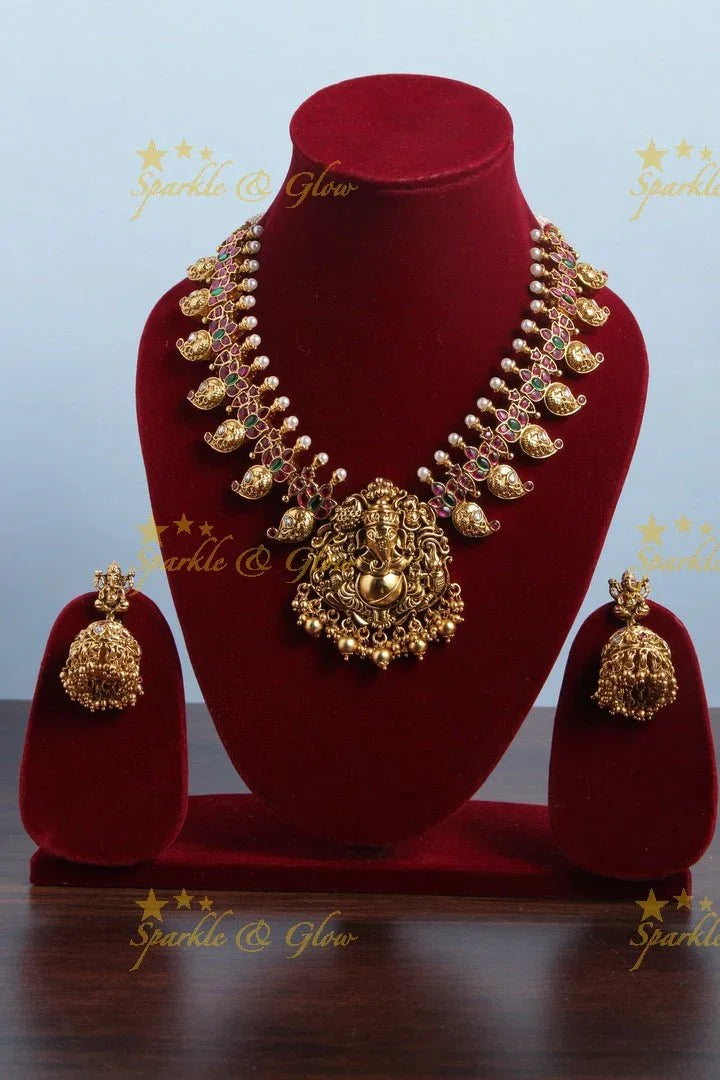 Gold alike Ganesha carved mango necklace - Sparkle and Glow