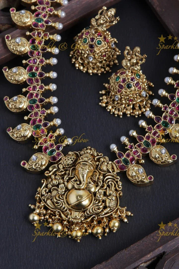 Gold alike Ganesha carved mango necklace - Sparkle and Glow