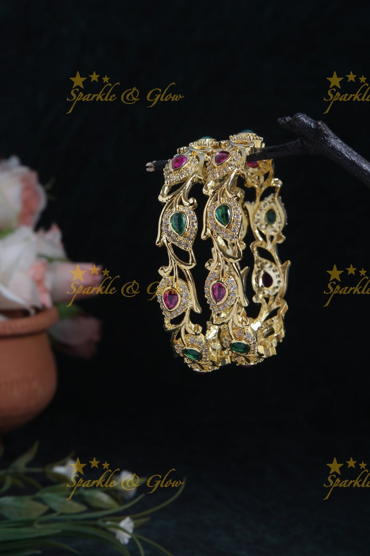 Gold polished leaf bangles a pair