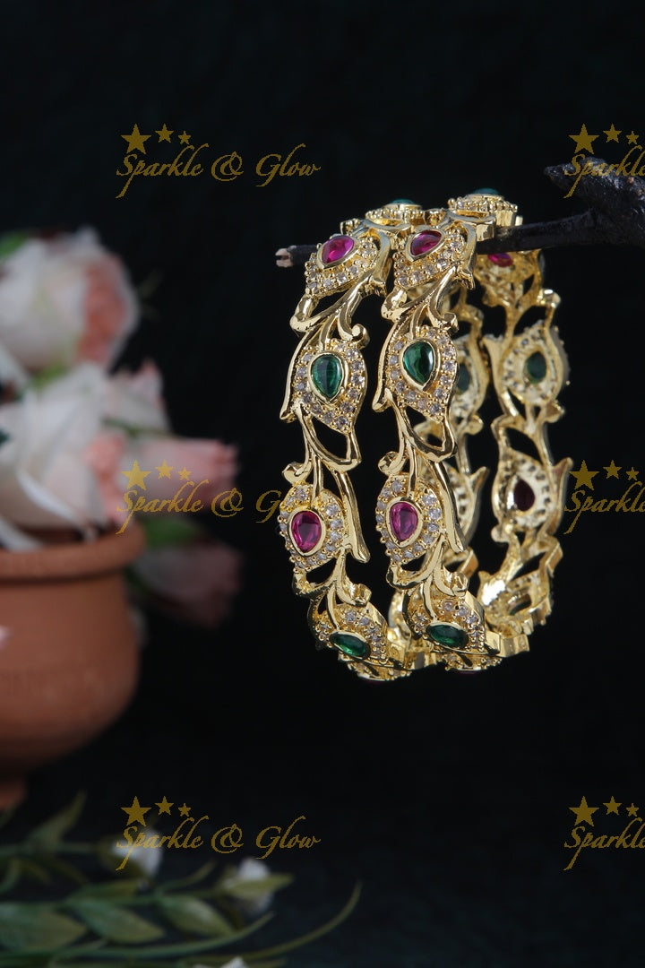 Gold polished leaf bangles a pair