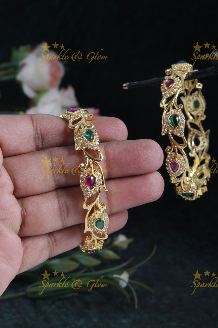 Gold polished leaf bangles a pair
