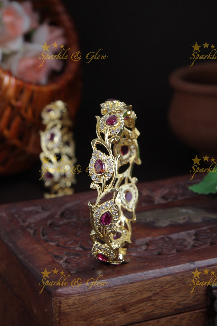 Gold polished leaf bangles a pair