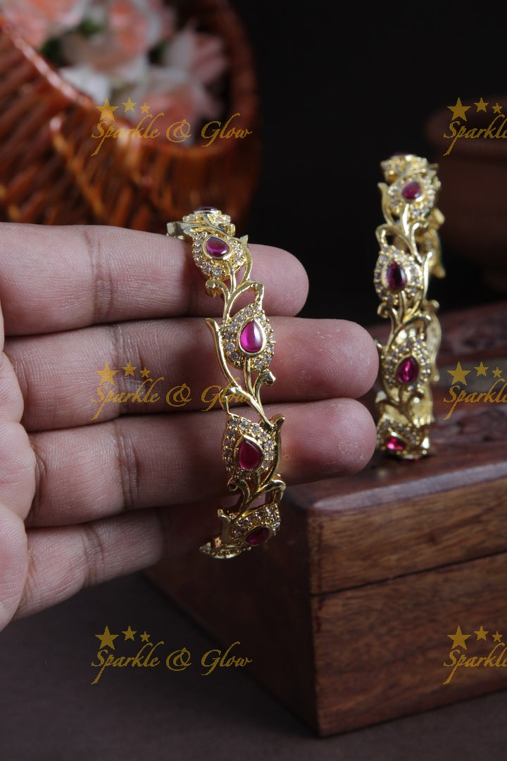 Gold polished leaf bangles a pair
